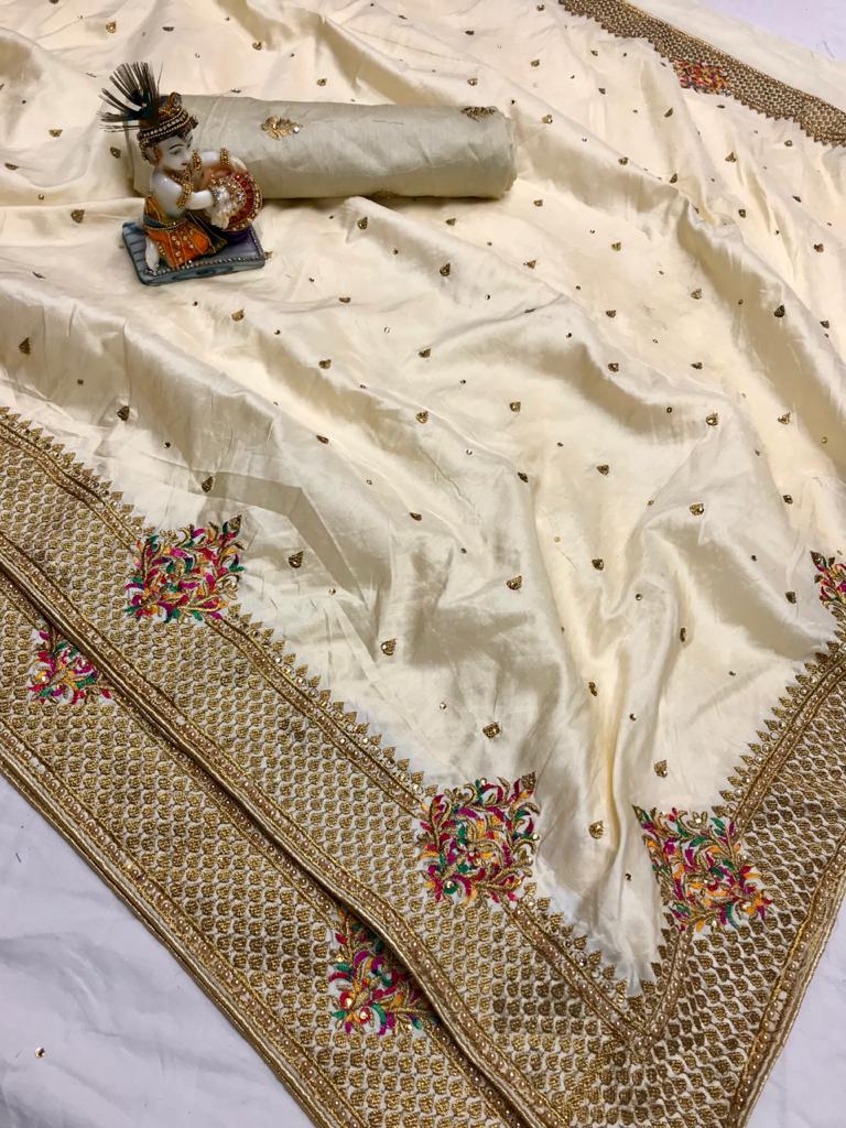 Yellow color pure silk saree with kashmiri embroidery work