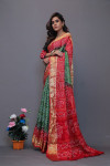 Green and red art silk saree with hand bandhej print