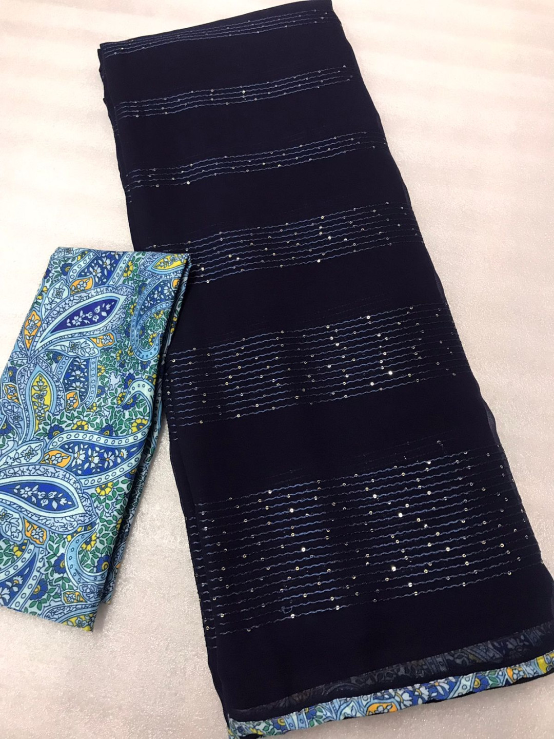 Navy blue color georgette saree with sequence work