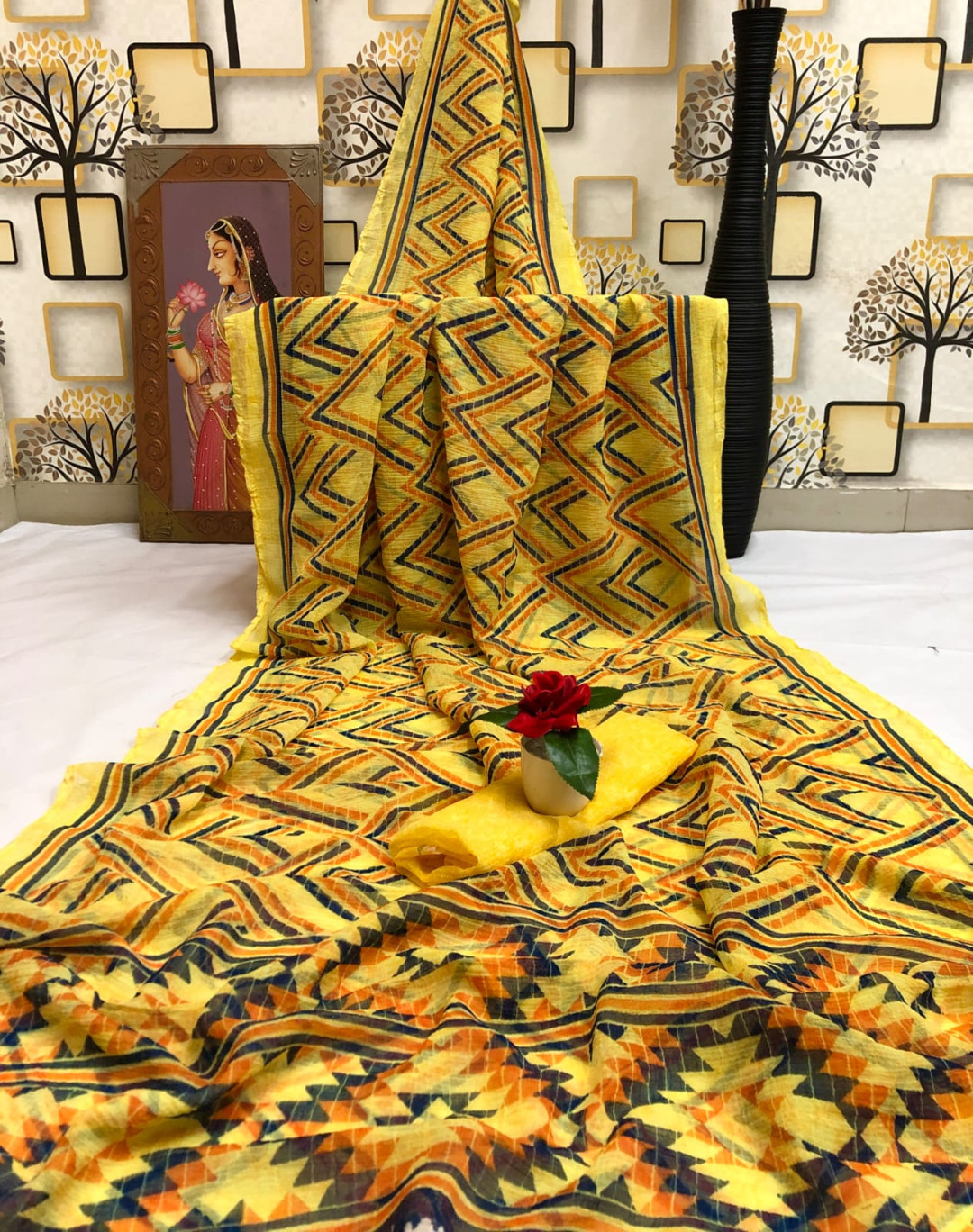 Yellow color moss chiffon saree with printed work