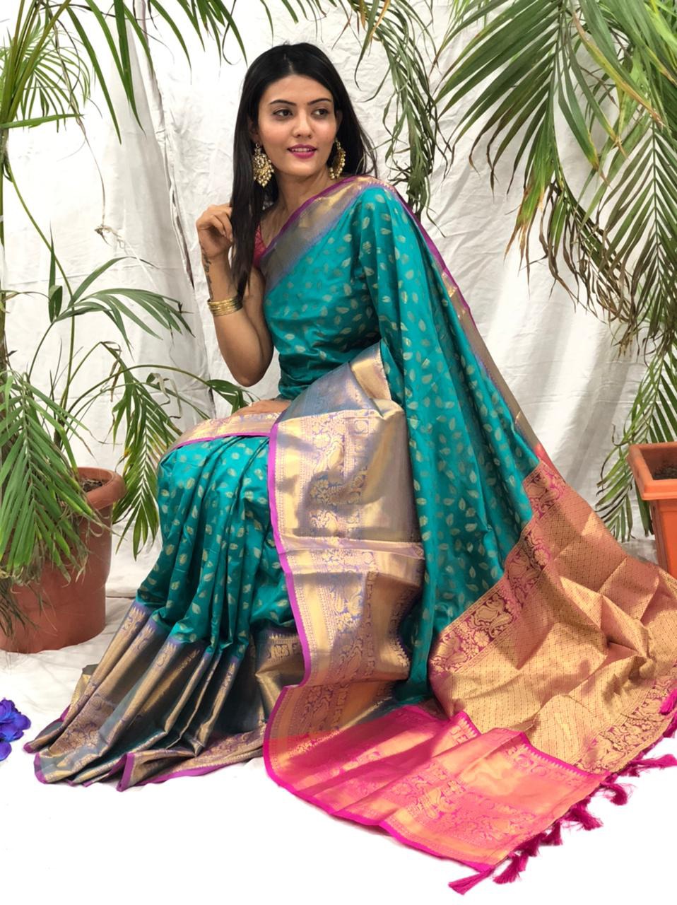 Rama green color kanchipuram silk saree with golden zari work