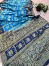 Sky blue and blue hand bandhej silk saree with zari weaving work