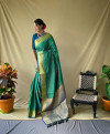 Green color patola silk saree with zari woven work