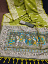 Green  color soft raw silk saree with woven design