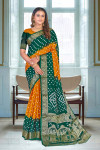 Green and yellow color bandhej silk saree with zari weaving work