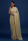 Cream color georgette silk saree with embroidery work