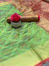 Pista green color patola silk saree with golden zari weaving work