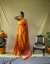 Orange color patola silk saree with golden zari woven work