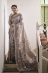 Gray color tussar silk saree with printed work
