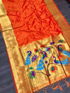 Orange color paithani silk saree with golden zari weaving work
