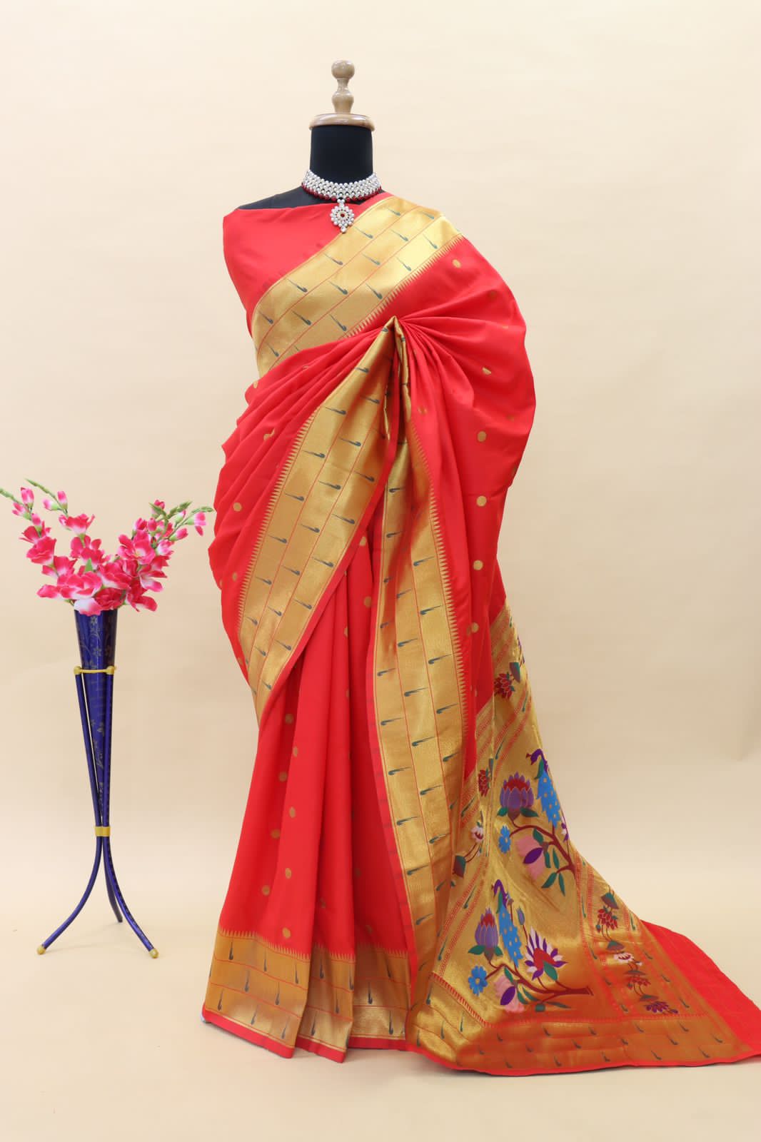 Red color paithani silk saree with zari weaving work