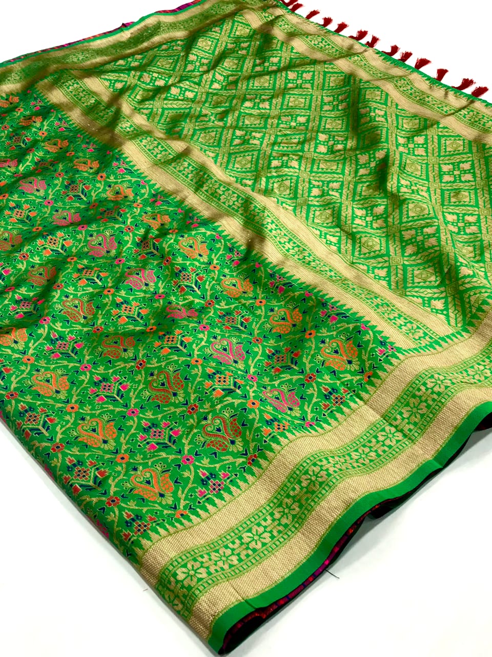 Green color banarasi silk saree with zari weaving work