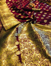 Magenta color soft lichi silk saree with golden zari work