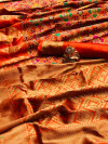 Orange color patola saree with woven design