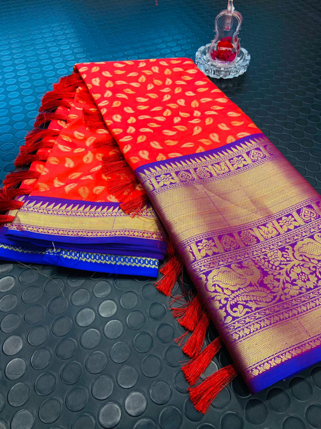 Red color kanchipuram silk saree with zari woven work