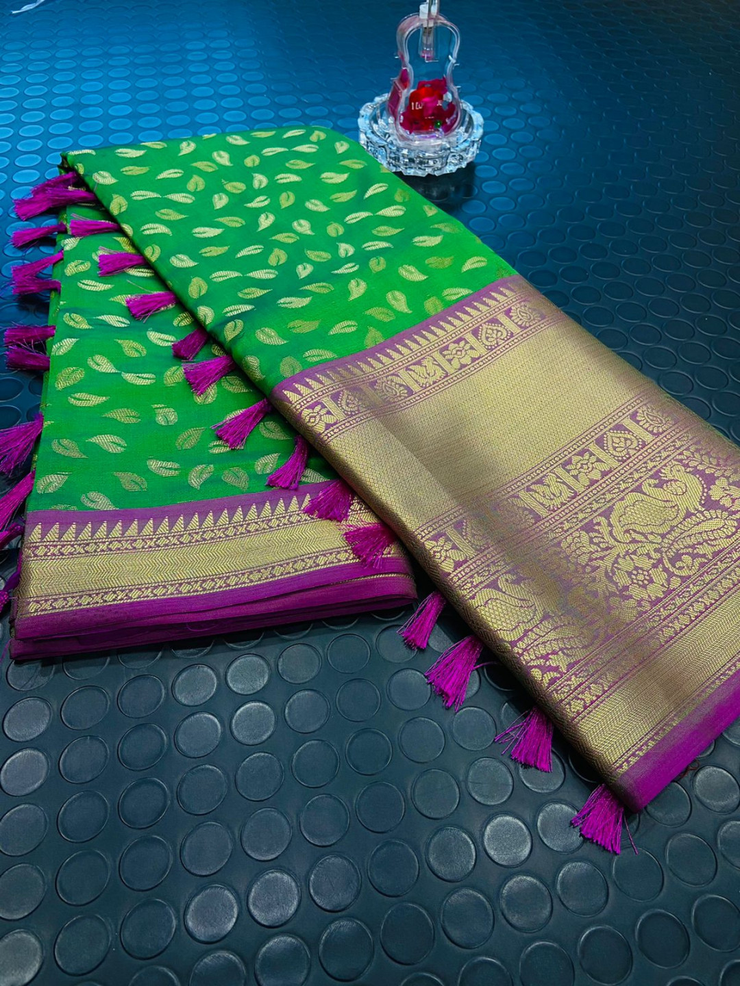 Green color kanchipuram silk saree with zari woven work