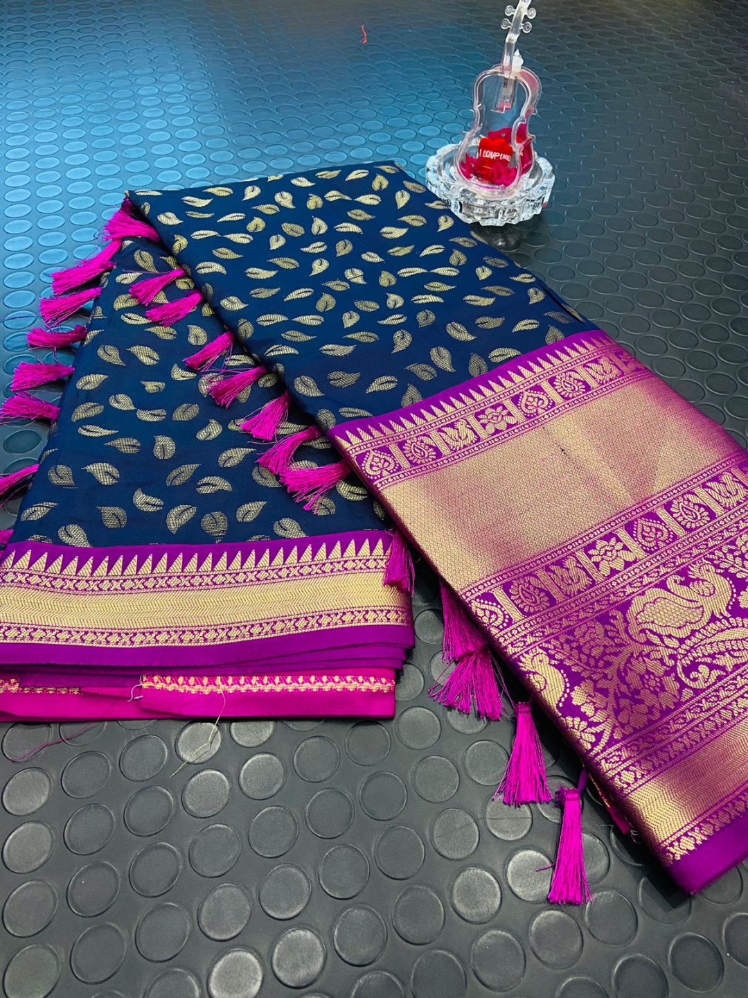 Navy blue color kanchipuram silk saree with zari woven work