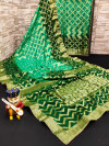 Sea green and mehndi green color art silk saree with zari weaving work