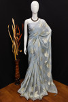 Gray color soft georgette saree with zari weaving work