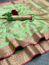 Parrot green color linen silk saree with golden zari weaving work