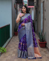 Purple color organza silk saree with woven design