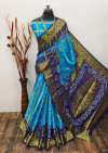 Sky blue and royal blue color hand bandhej silk saree with zari weaving work