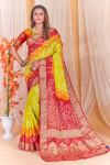 Lemon yellow color bandhej silk saree with zari weaving work