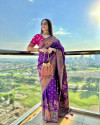 Purple color banarasi silk saree with zari weaving work