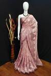 Baby pink color soft georgette saree with zari weaving work