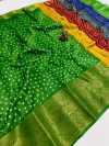 Parrot green color jacquard silk saree with bandhej printed work