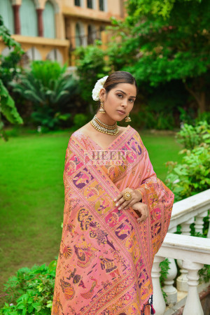 Baby pink color banarasi silk saree with zari weaving work