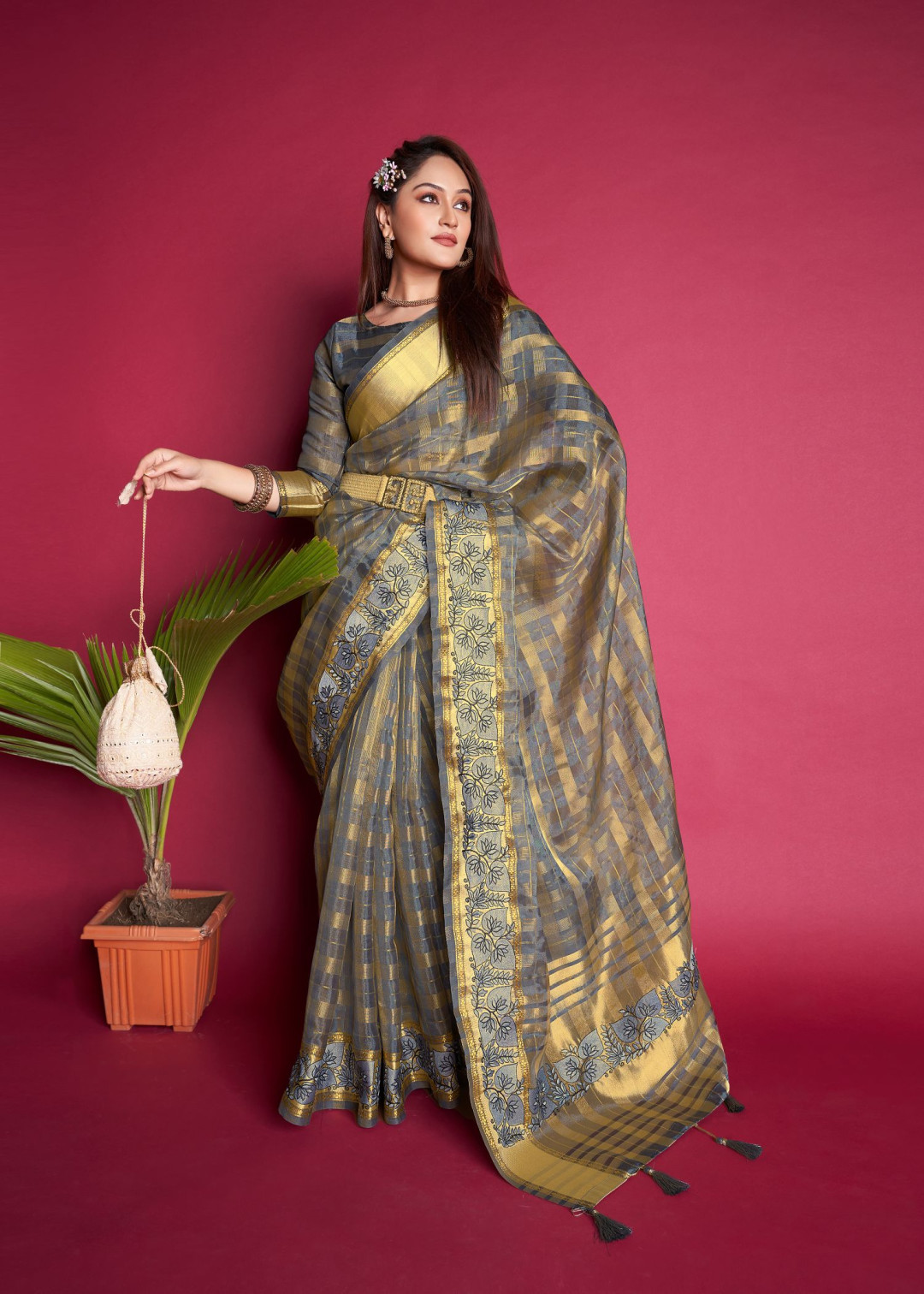 Gray color organza silk saree with embroidered and zari weaving work