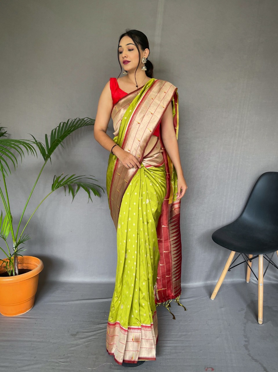 Parrot green color paithani silk saree with zari weaving work