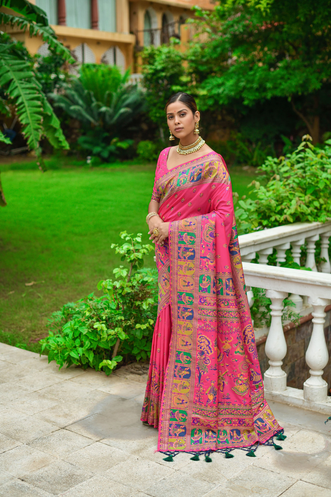 Rani pink color banarasi silk saree with zari weaving work