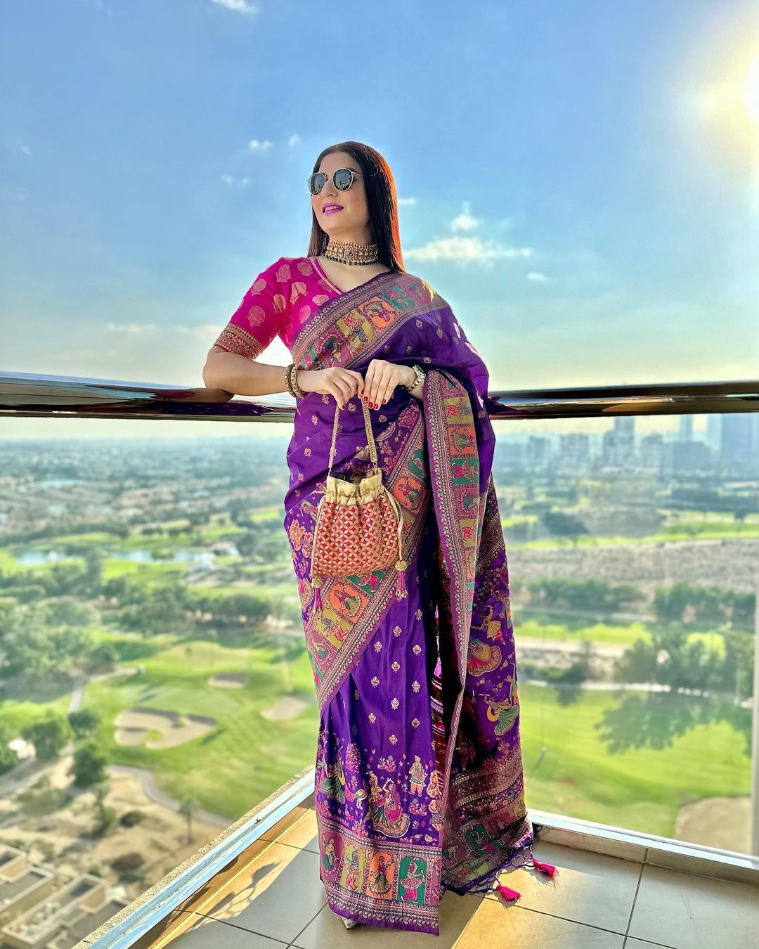 Purple color banarasi silk saree with zari weaving work