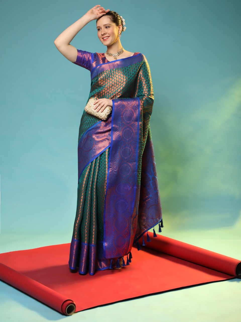 Rama green color kanchipuram silk saree with zari woven work