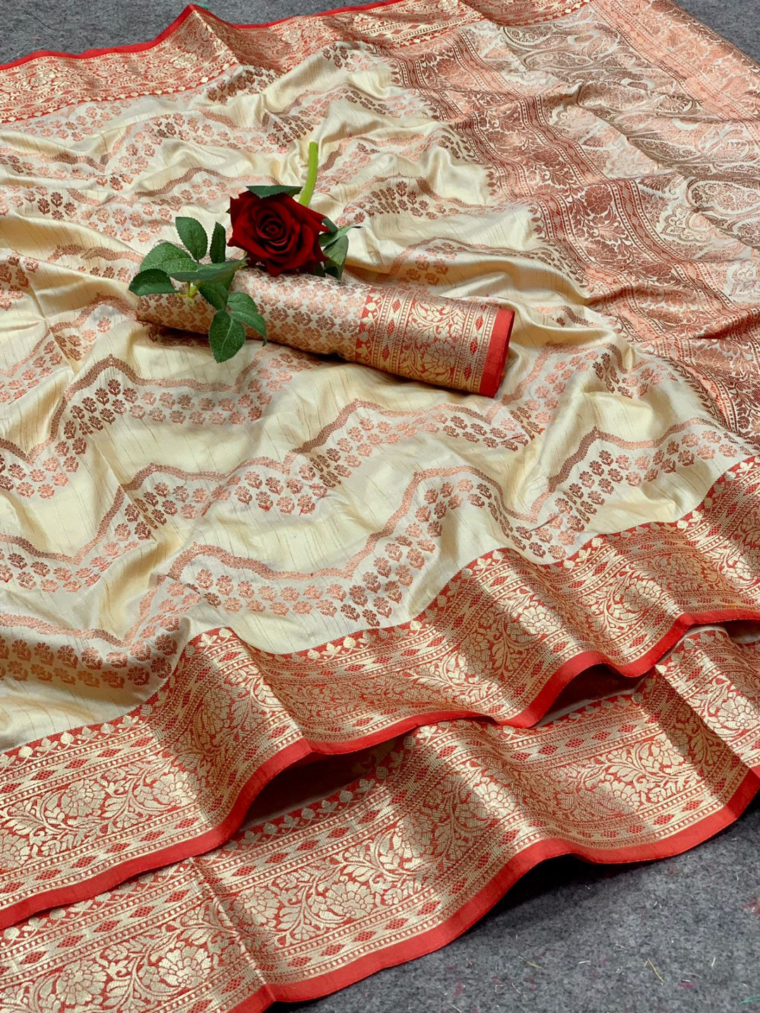 Off white color linen silk saree with golden zari weaving work
